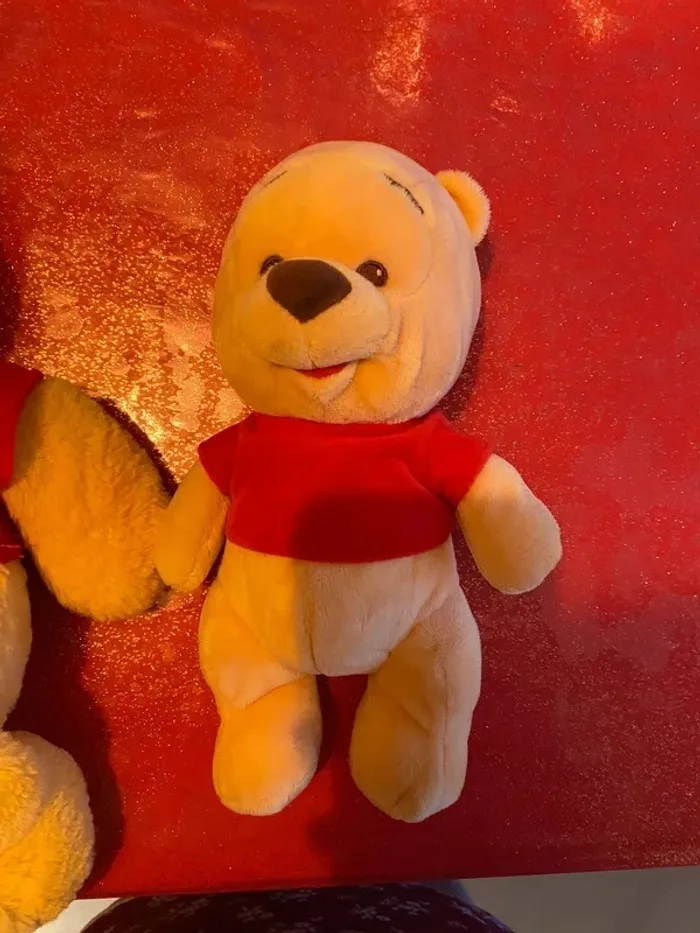 Peluche Winnie l'ourson bébé