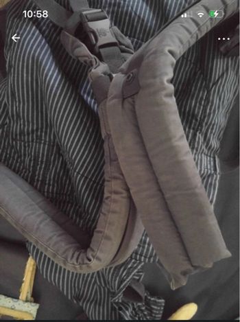 Porte bébé ergo baby et couussin pour noirisdon complète