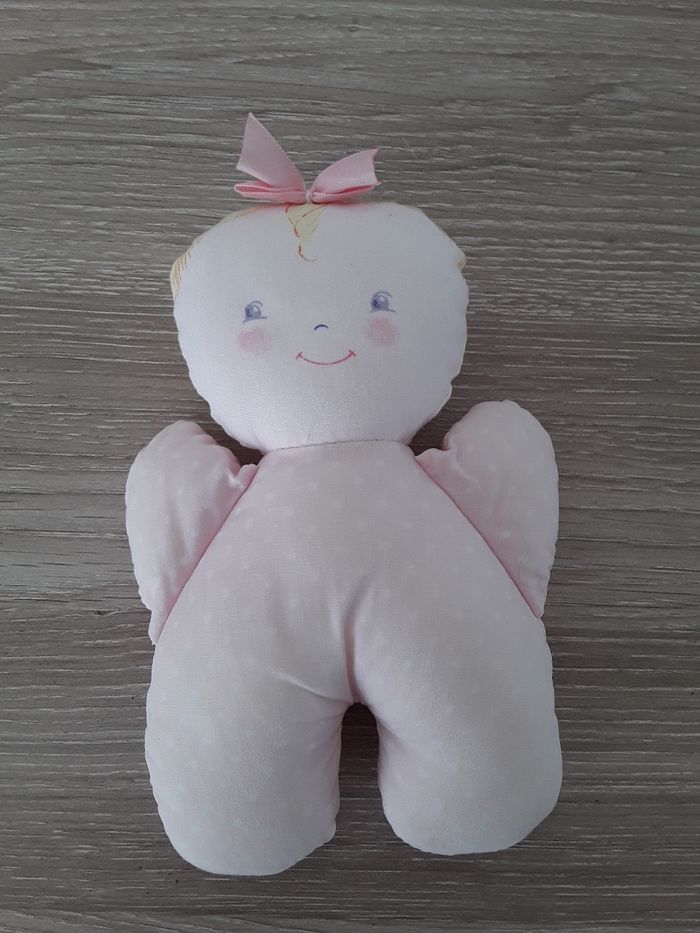 Peluche poupée corolle