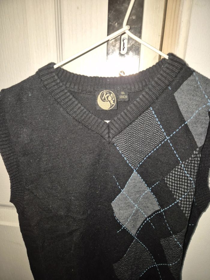 Pull noir sans manche - photo numéro 2