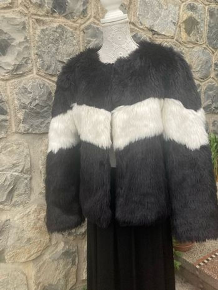 Manteau fausse fourrure