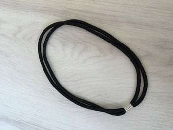 Serre tête noir jamais utilisé