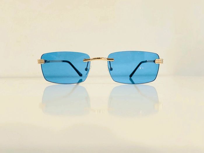 Lunette de soleil mixte percée dorée verres bleus uvprotection taille small - photo numéro 2