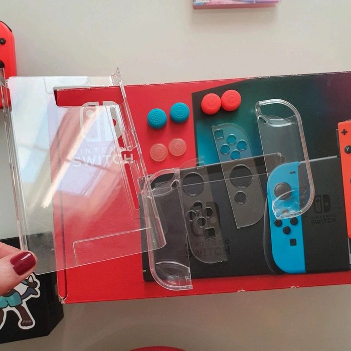 Switch complète + 2 jeux + 2 manettes - photo numéro 13
