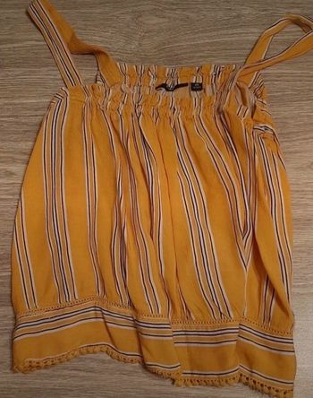 a vendre debardeur kiabi.porte 2x.taille 12ans