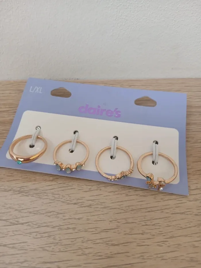 4 bagues doré Claire's neuves - photo numéro 4