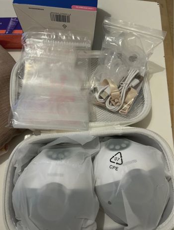 Tire lait main libre 