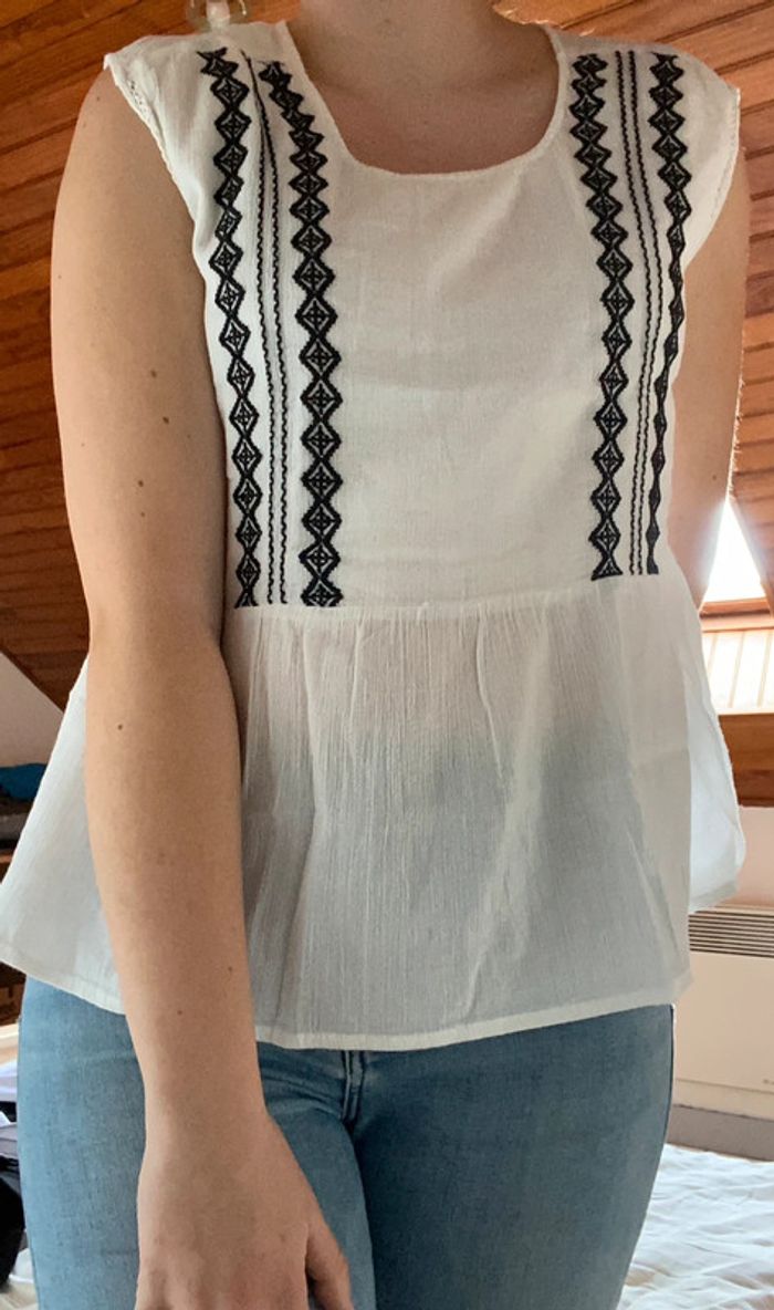 Blouse sans manches/ top péplum