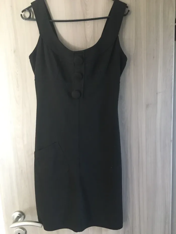 Robe noire chasuble