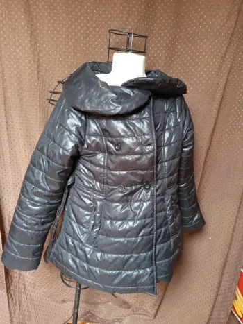 Manteau noir a boutons  12ans