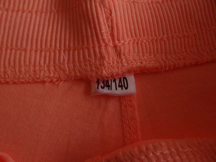 short en tissus orange fluo 8-10ans - photo numéro 3