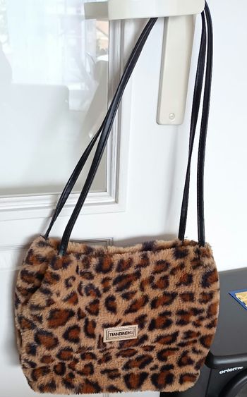 Sac fausse fourrure léopard  Neuf