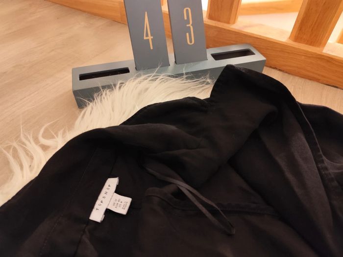 Veste longue noire avec ceinture
