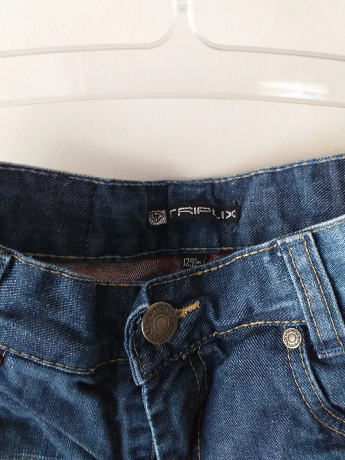 Jeans avec effet délavé par endroits - photo numéro 3