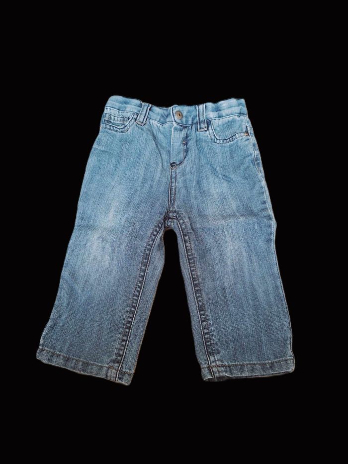 Jean Okaidi/Obaibi 12 mois