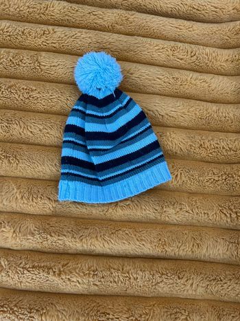 Bonnet bébé bleu à rayures