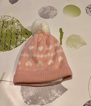 Bonnet rose et blanc taille unique soit 1/2 ans environ