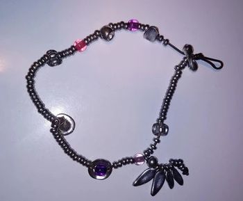 Bracelets perles  argentés et breloque