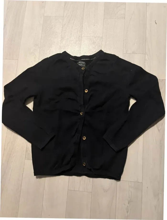 Petit gilet noir boutons doré 6 ans Kiabi très bon état