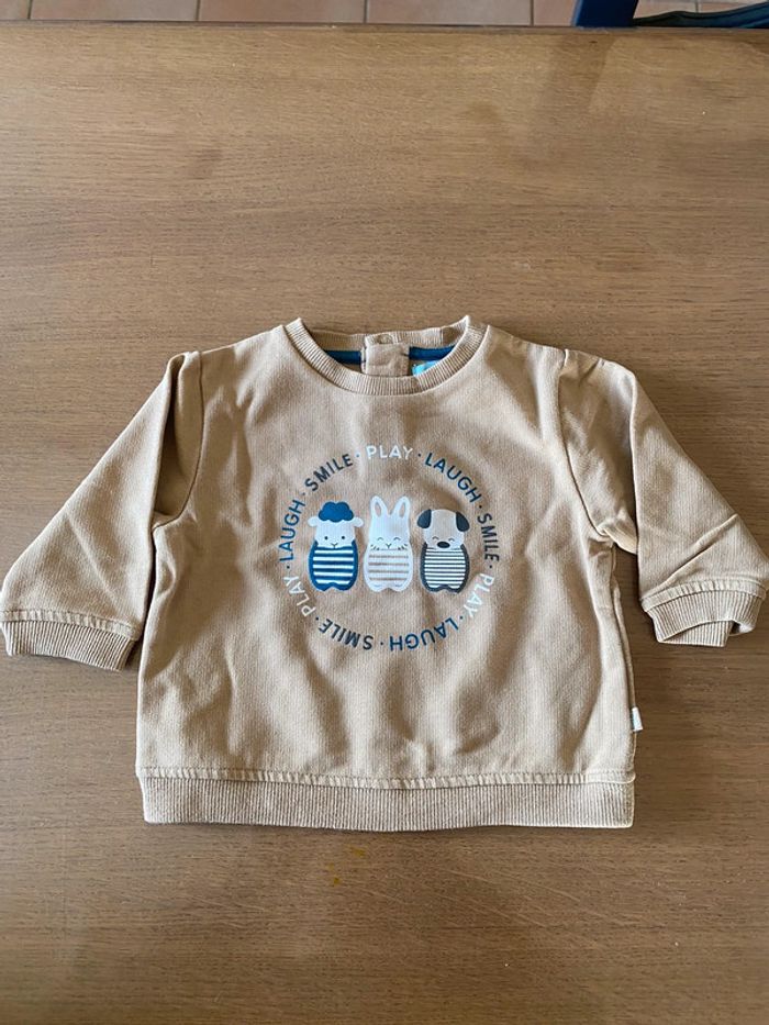 Pull marron animaux