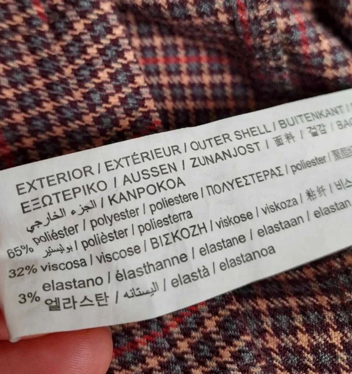 Jolie robe à bretelles Pull & Bear
Motif tweed - photo numéro 7