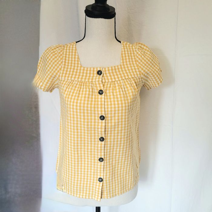 Chemisette sans manche blanche et jaune. Fille 12 ans. Marque Kiabi