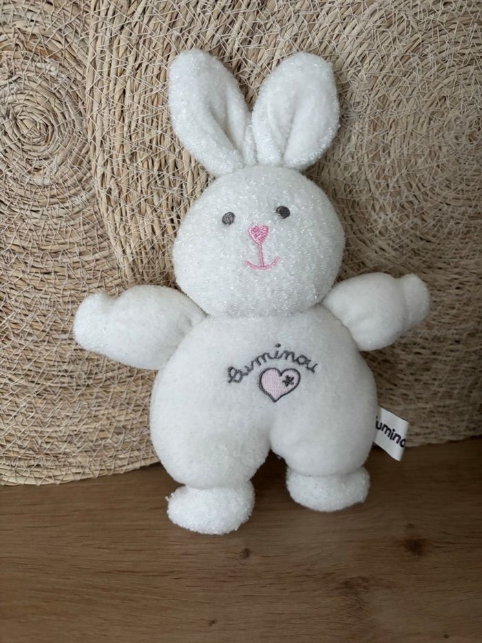 Doudou lapin blanc phosphorescent grelot cœur luminou