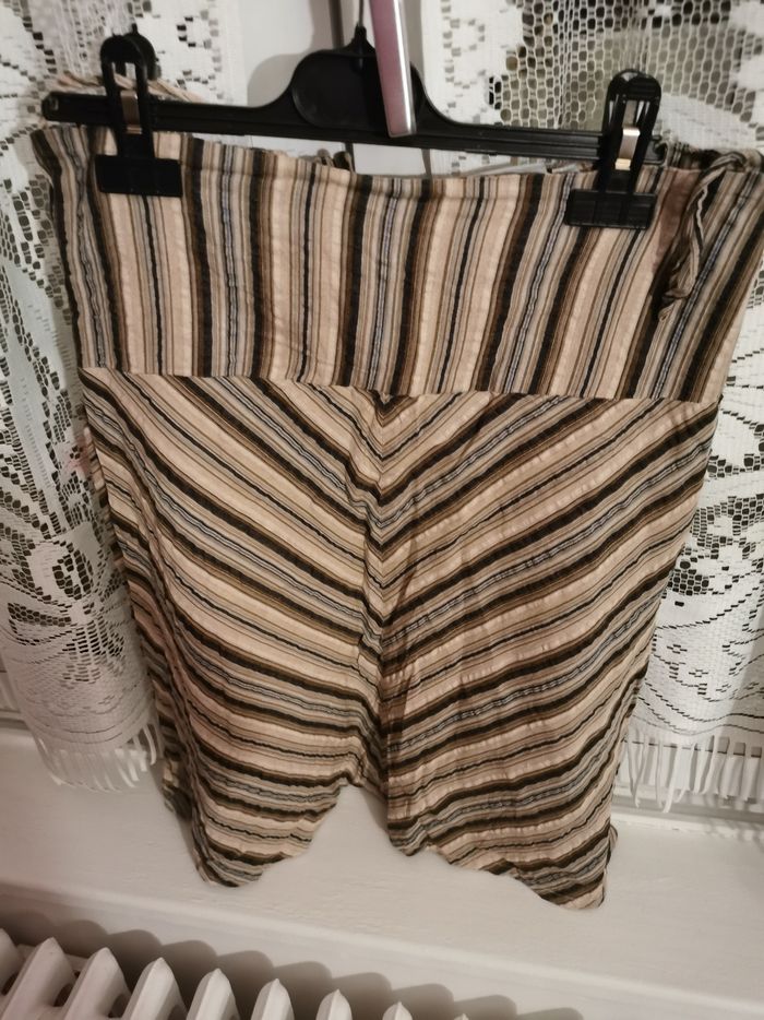 Jupe courte, lacets et perles - photo numéro 2