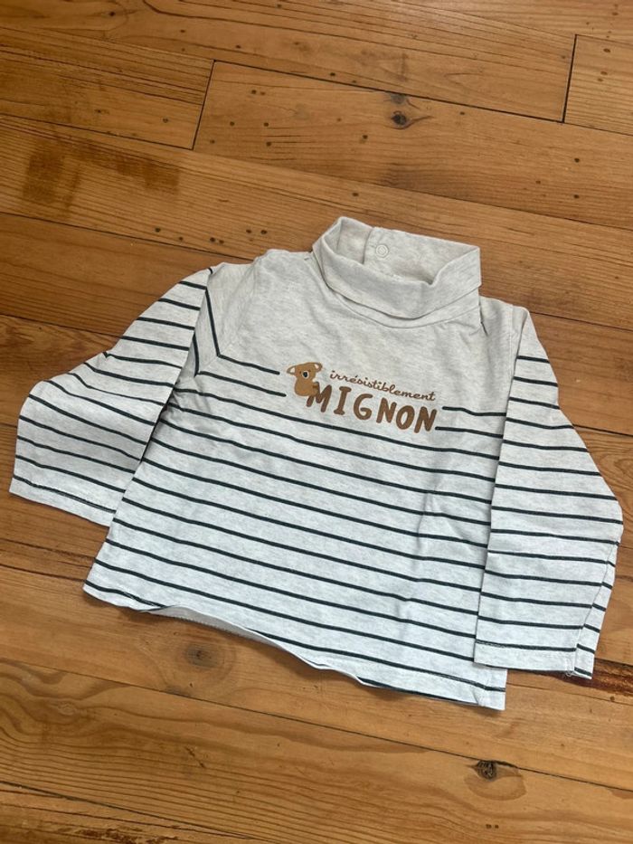 Pull fin col roulé