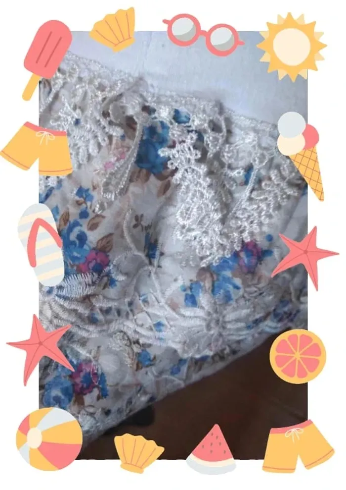 Mini jupe blanche et fleurie - photo numéro 3