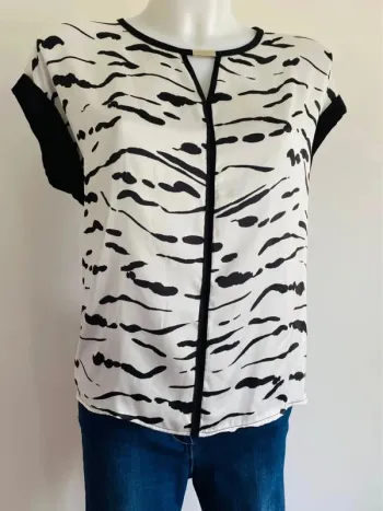 Joli haut satiné riu 38/40 noir et blanc