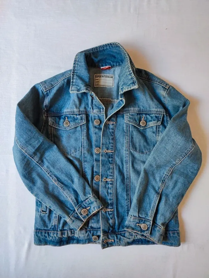 Veste en jean impeccable 10 ans