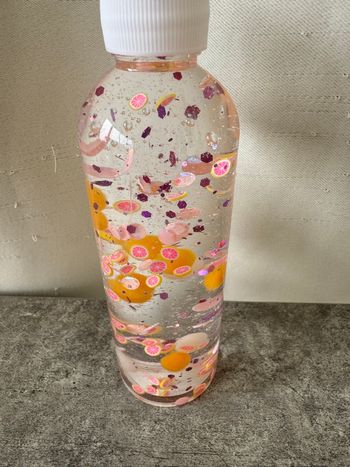 Bouteille sensorielle thème pamplemousse 