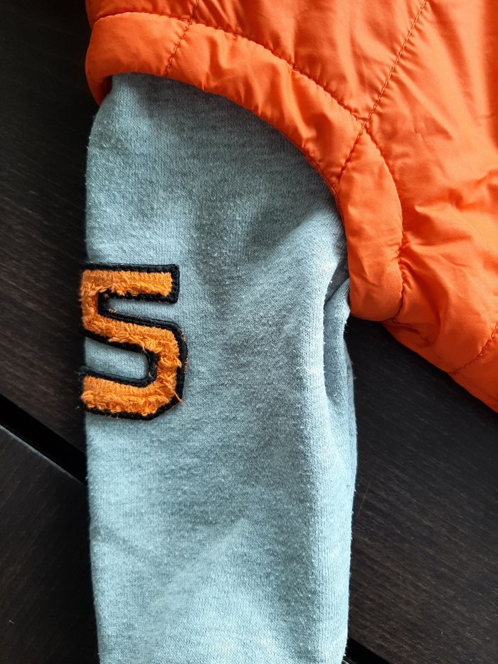 Veste doudoune avec manches pull - photo numéro 3