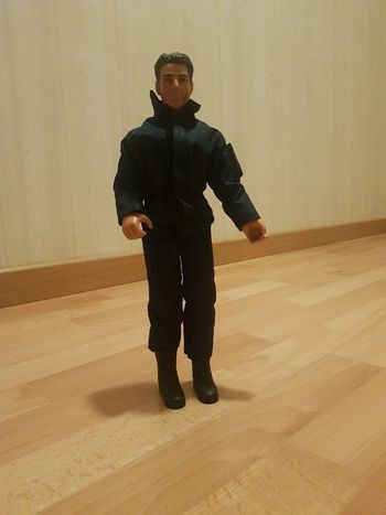 Figurine power team avec tenue et bottes et ceinture