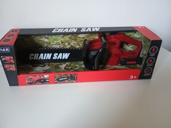 Tronçonneuse électrique enfant neuve son et lumière parfait pour offrir