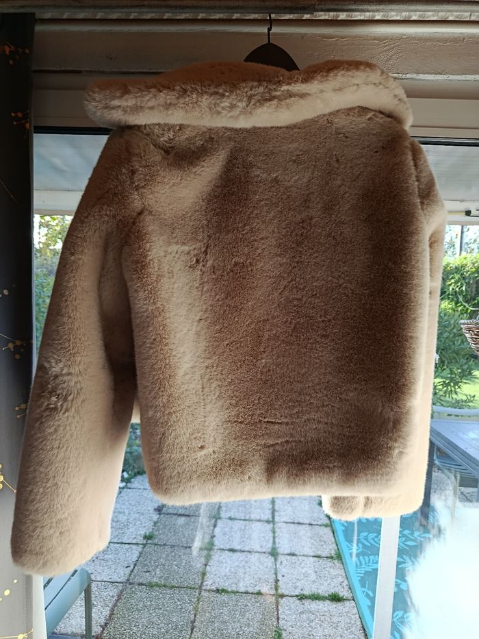 Manteau en fausse fourrure