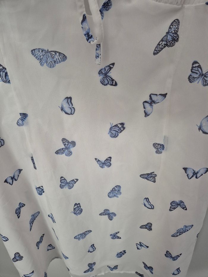 Magnifique robe taille 44 fermeture sur le cote avec papillon - photo numéro 2