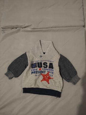 Pull un peu usé