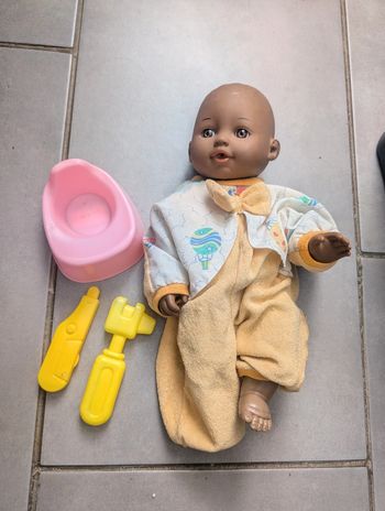 Poupon avec accessoires
