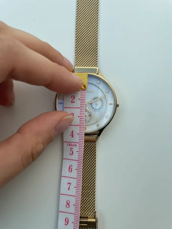 Montre doré quantum - photo numéro 5