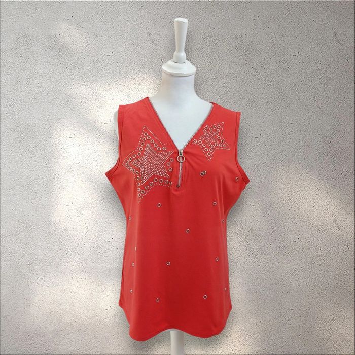 Top sans manche corail avec décolleté zippé 46