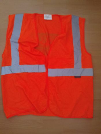 Veste orange Taille M neuf