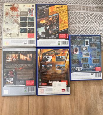 Jeux ps2 lot god of war/most wanted …