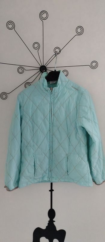 Veste coupe-vent bleu clair Quechua taille 8 ans