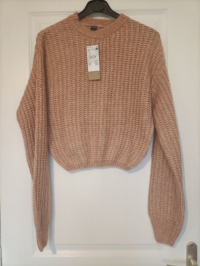 Joli pull neuf type laine rose XS kiabi
