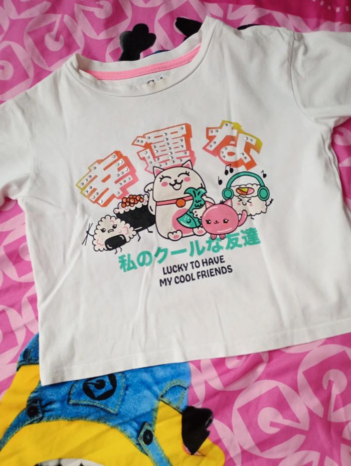 T-shirt C&A manga 122 cm