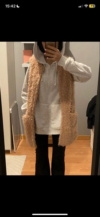 Fourrure rose sans manche