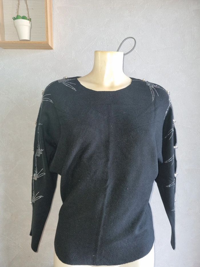 Pull manches ouverte