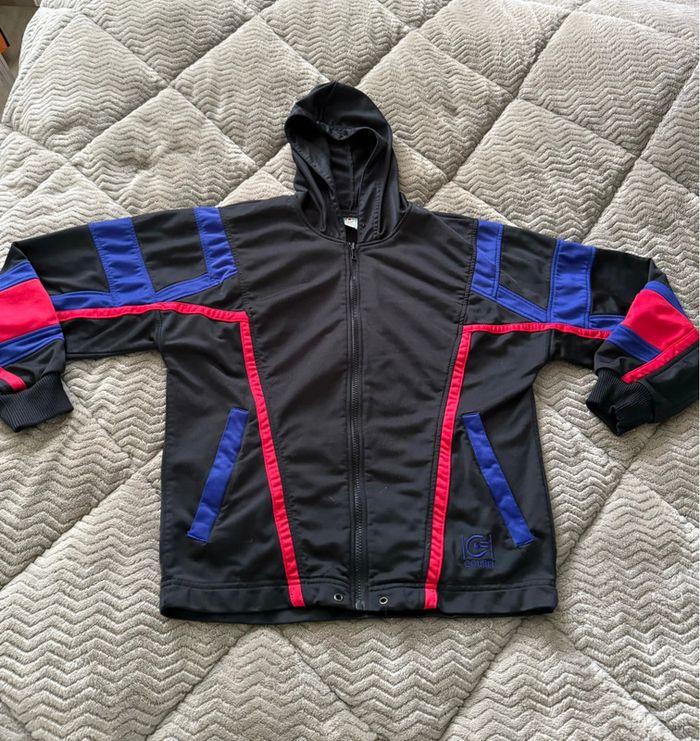 Veste de sport vintage courir en très bon état taille XS